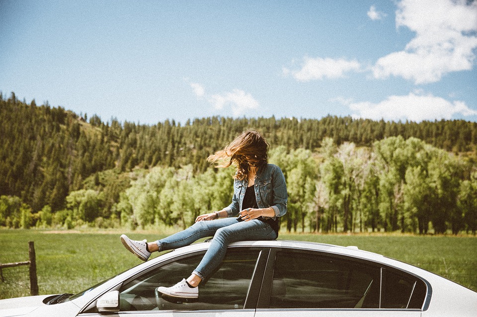 woman on a car